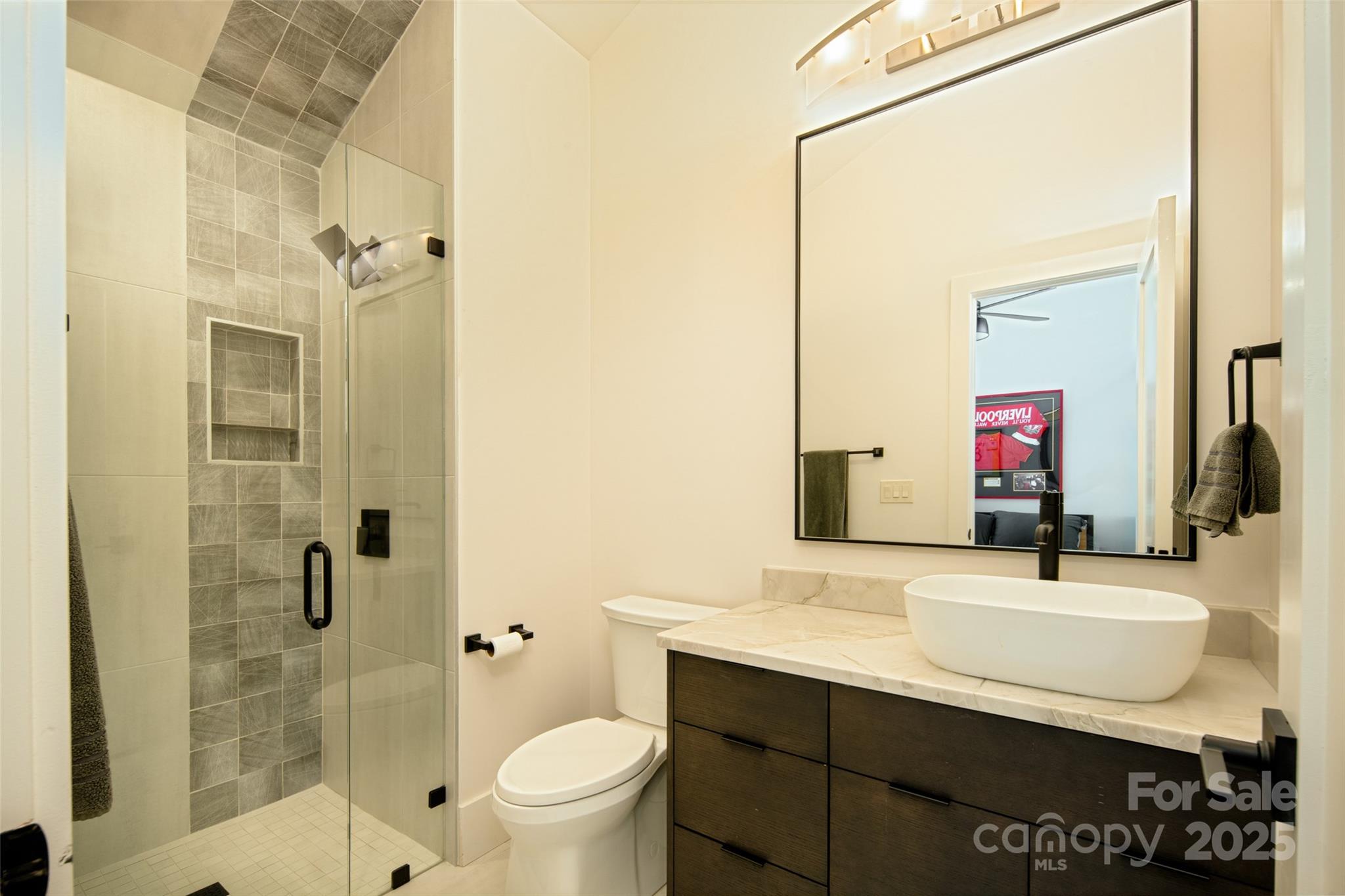 42 Spring Cove Road Asheville, NC 28804 - Photo 27 of 43 a bathroom with a sink and a mirror