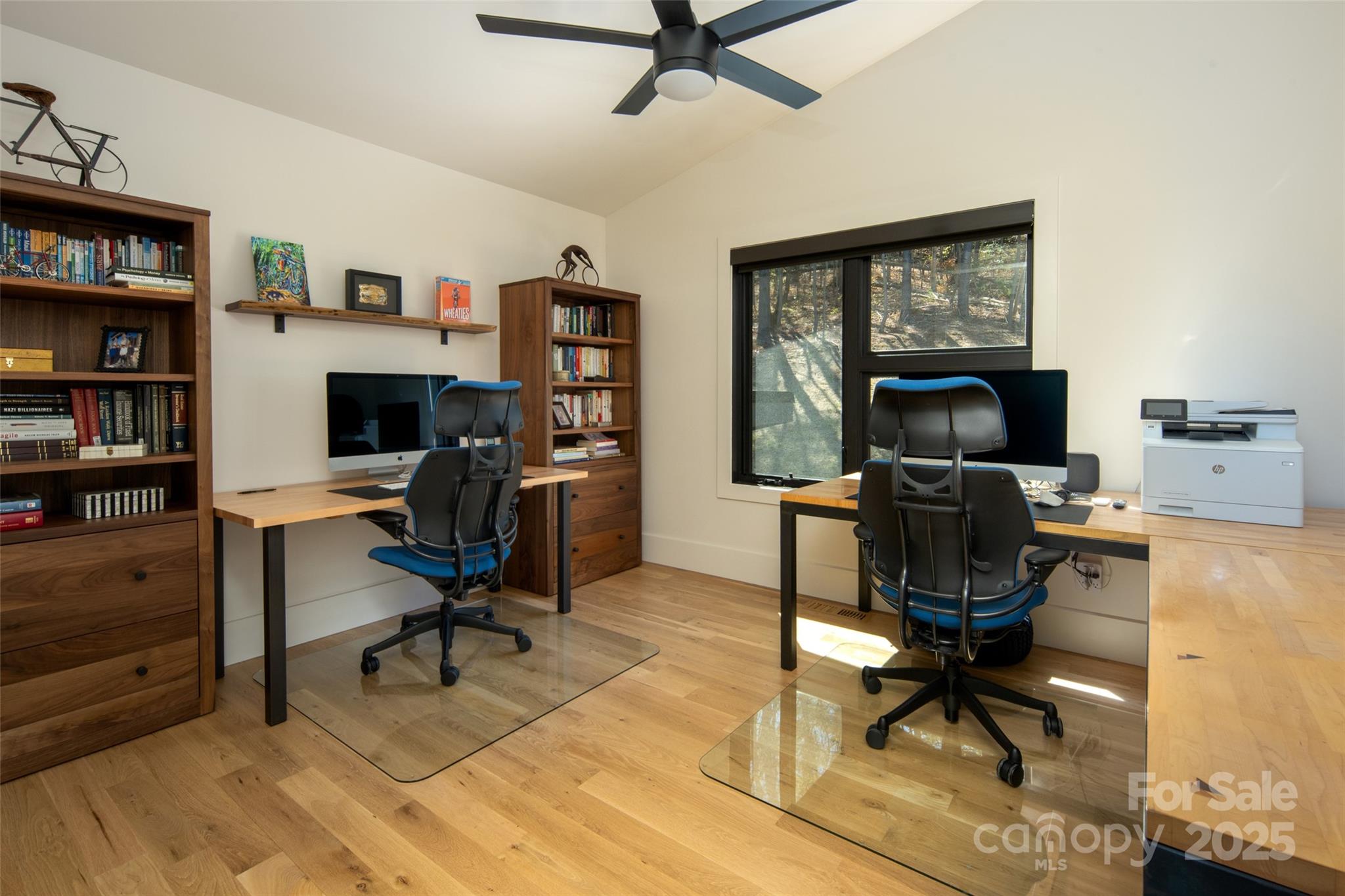 42 Spring Cove Road Asheville, NC 28804 - Photo 30 of 43 a view of a workspace with furniture and a bookshelf
