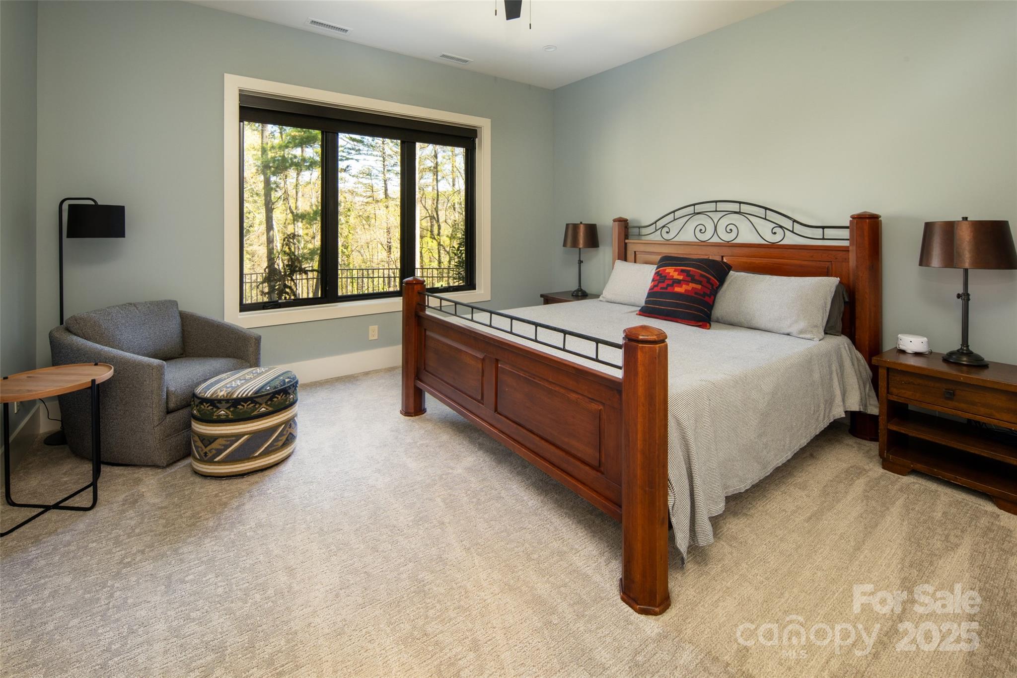 42 Spring Cove Road Asheville, NC 28804 - Photo 39 of 43 a bedroom with a bed and a couch