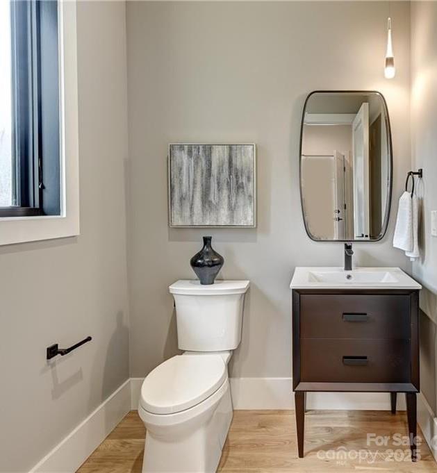 42 Spring Cove Road Asheville, NC 28804 - Photo 43 of 43 a bathroom with a toilet sink and mirror