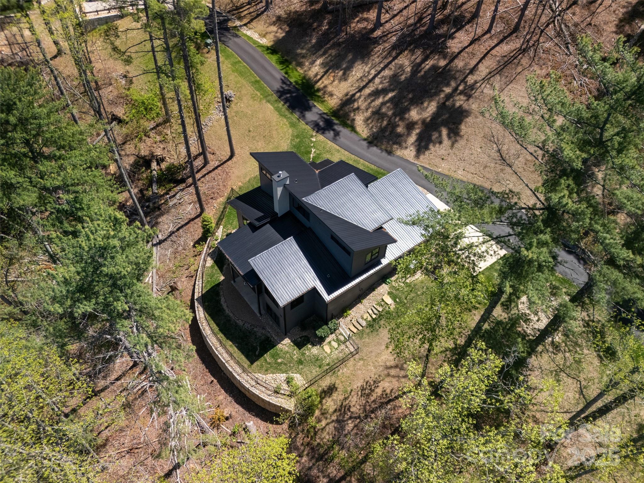 42 Spring Cove Road Asheville, NC 28804 - Photo 8 of 43 an aerial view of a house with a yard
