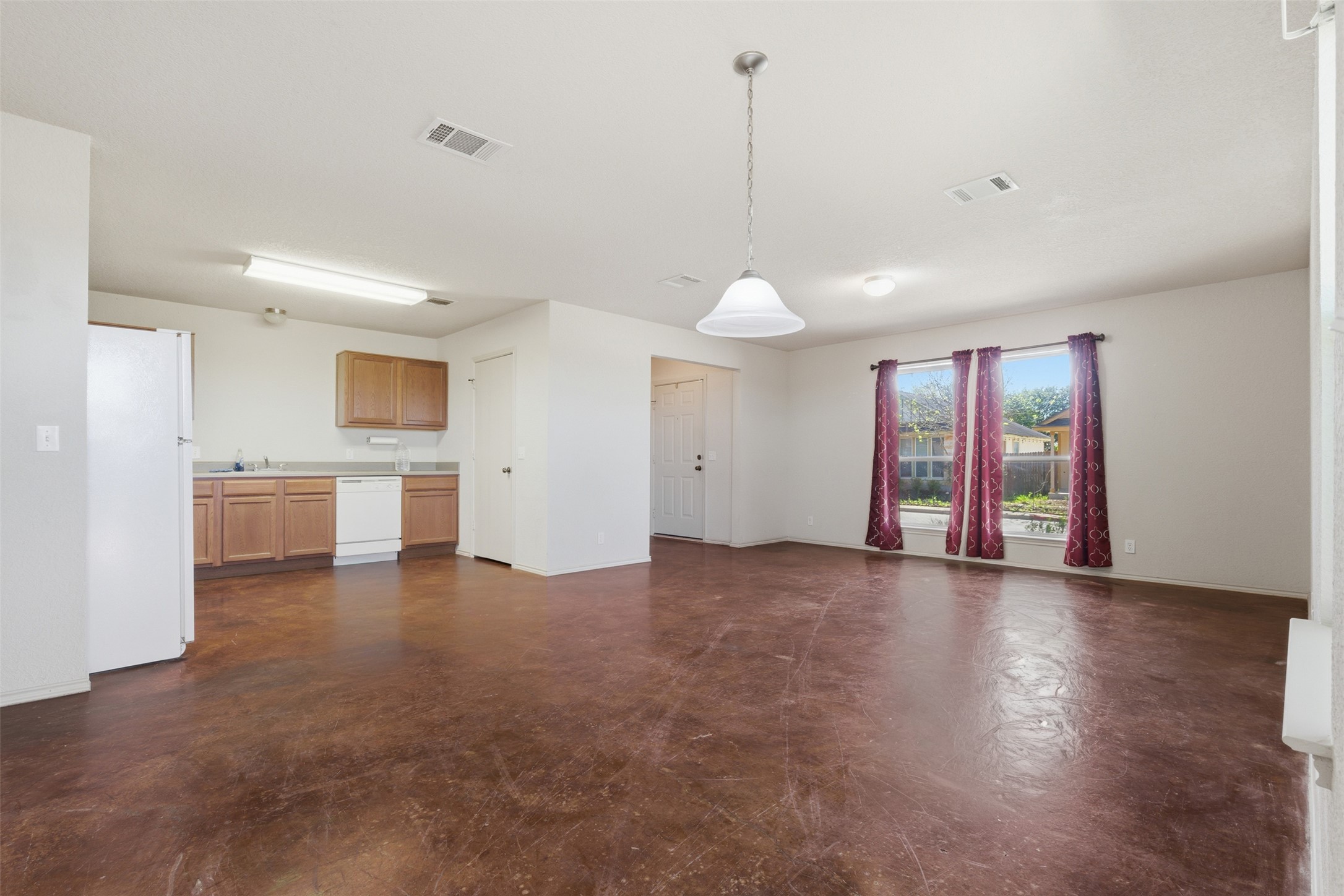 4529 Secure Lane, Unit 31 Austin, TX 78725 - Photo 7 of 38 a view of a kitchen with a sink and a window