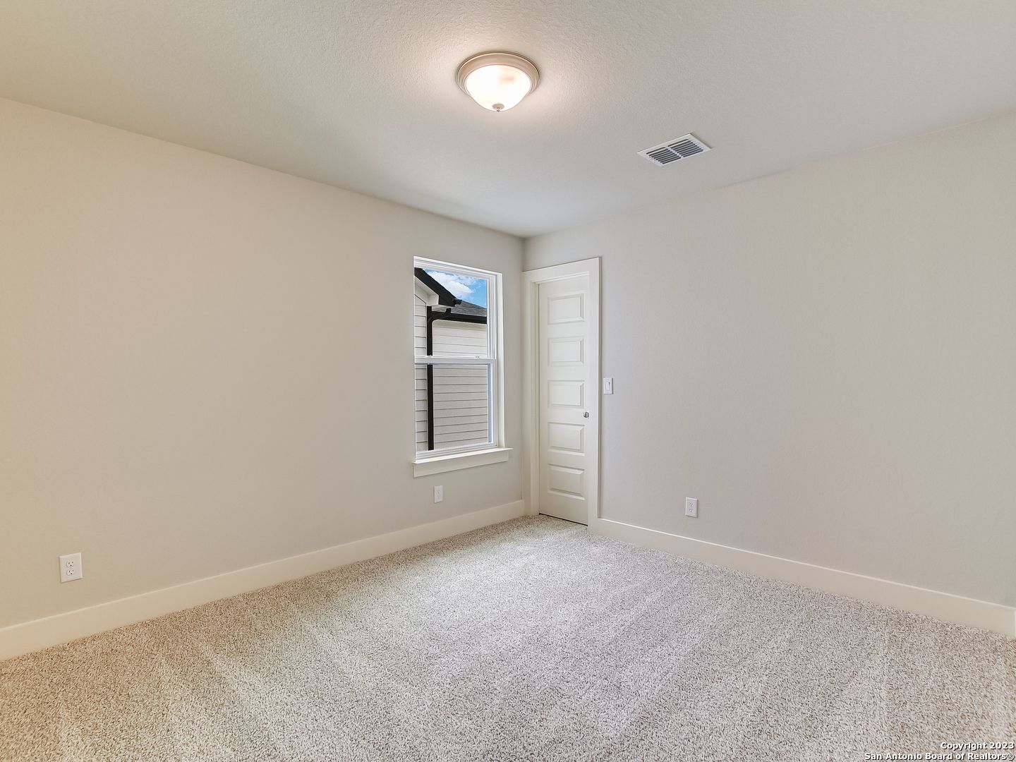 16011 Babcock Road, Unit 22 San Antonio, TX 78255 - Photo 17 of 20 an empty room with windows