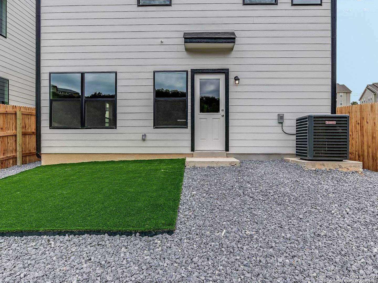 16011 Babcock Road, Unit 22 San Antonio, TX 78255 - Photo 19 of 20 a view of a house with a backyard