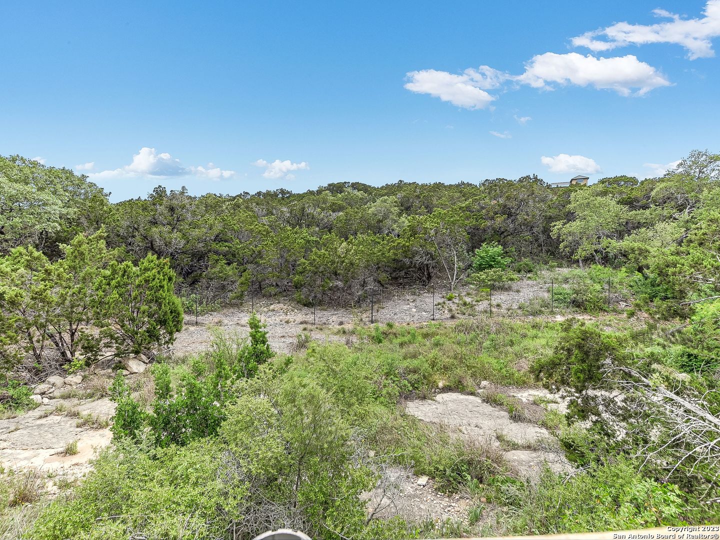 16011 Babcock Road, Unit 22 San Antonio, TX 78255 - Photo 20 of 20 a view of a bunch of trees in the background