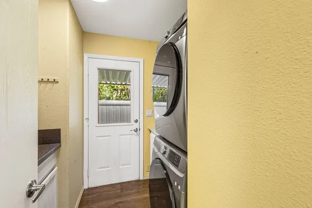 a bathroom with a sink a toilet and a shower