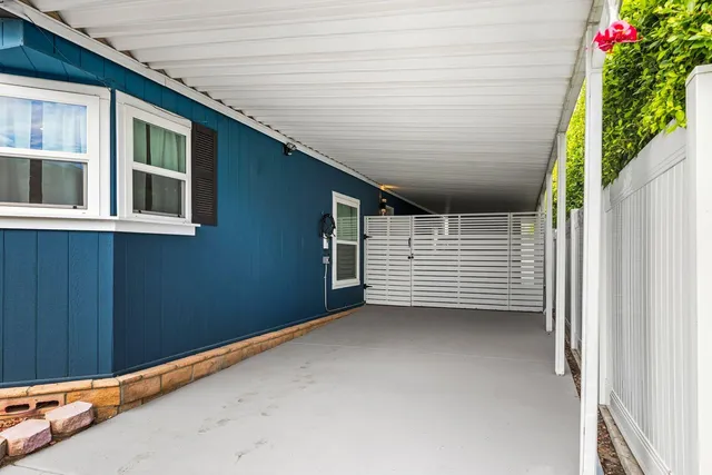 a view of a swimming pool table and chairs