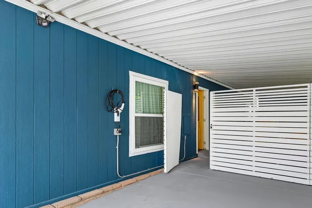 a view of chair and table in patio