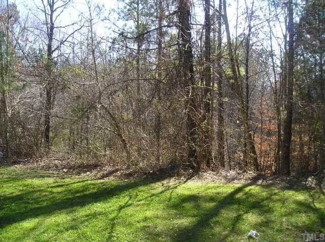5543 Fieldcross Court Raleigh, NC 27610 - Photo 6 of 9 Private backyard overlooking natural area