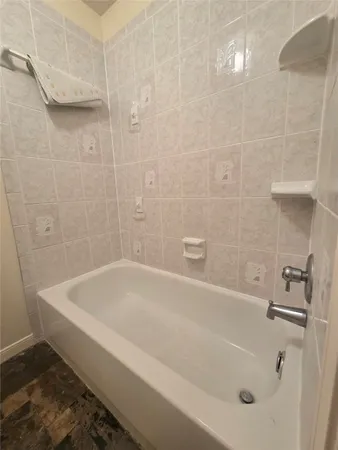 a bathroom with a bathtub