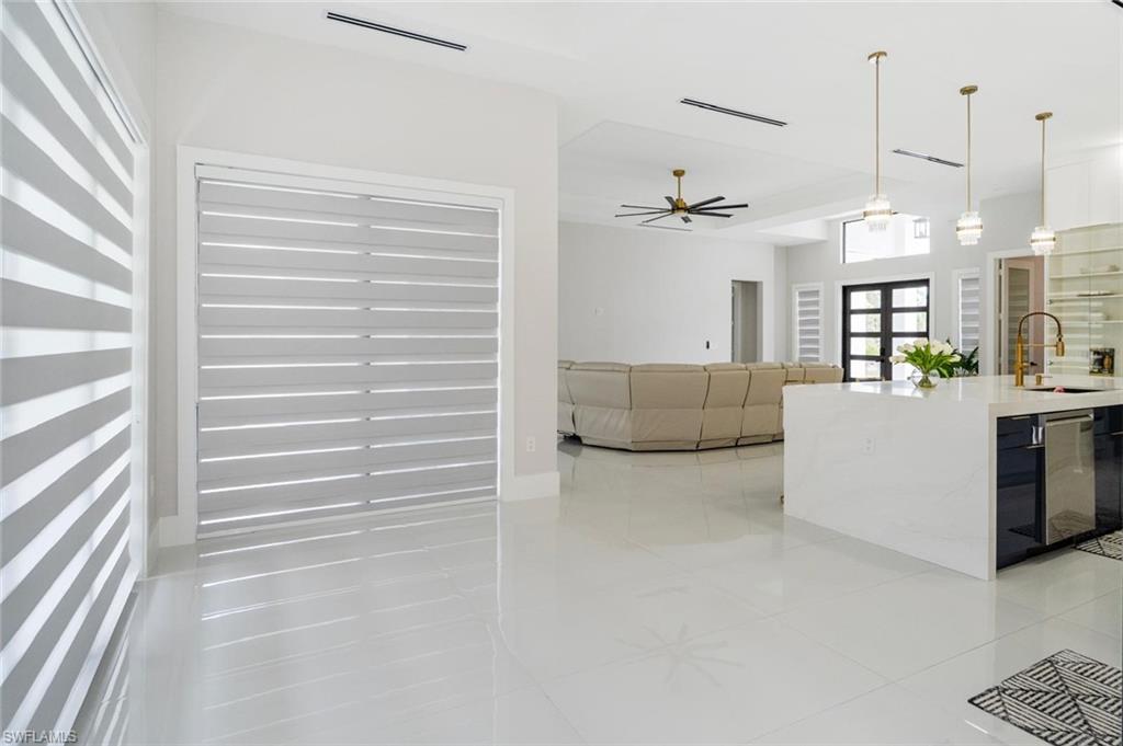 2313 6th Avenue Southeast Naples, FL 34117 - Photo 30 of 36 a view of kitchen and living room