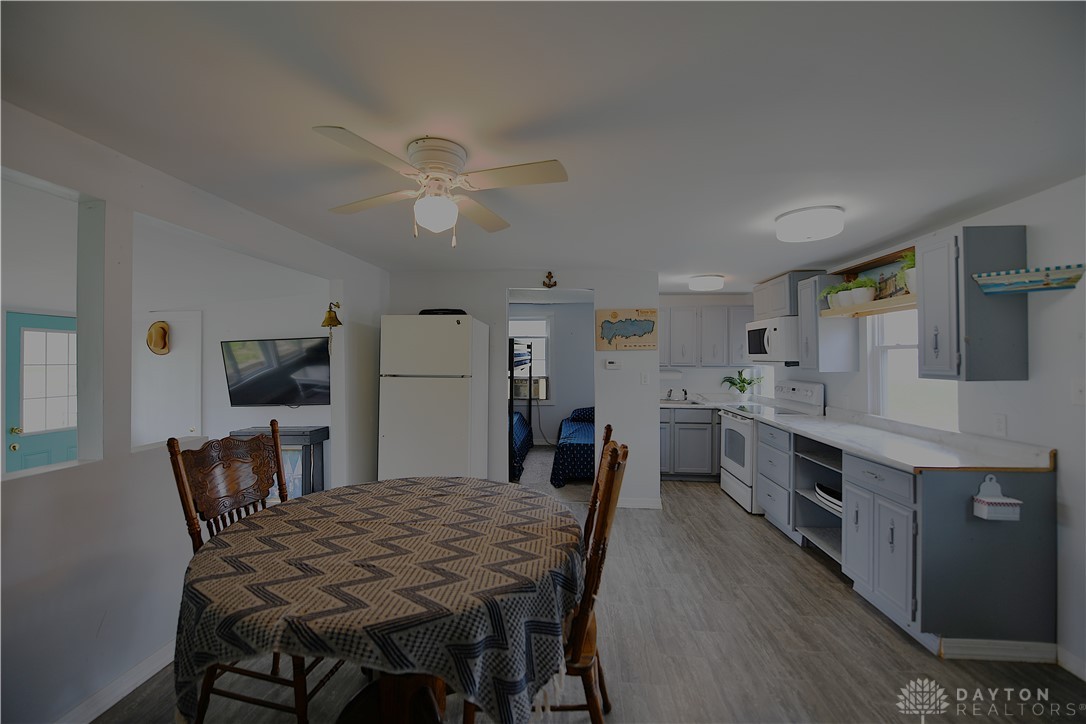 5445 Behm Road, Unit 15 Celina, OH 45822 - Photo 8 of 49 This bright and airy open-concept space offers a harmonious blend of living and dining.