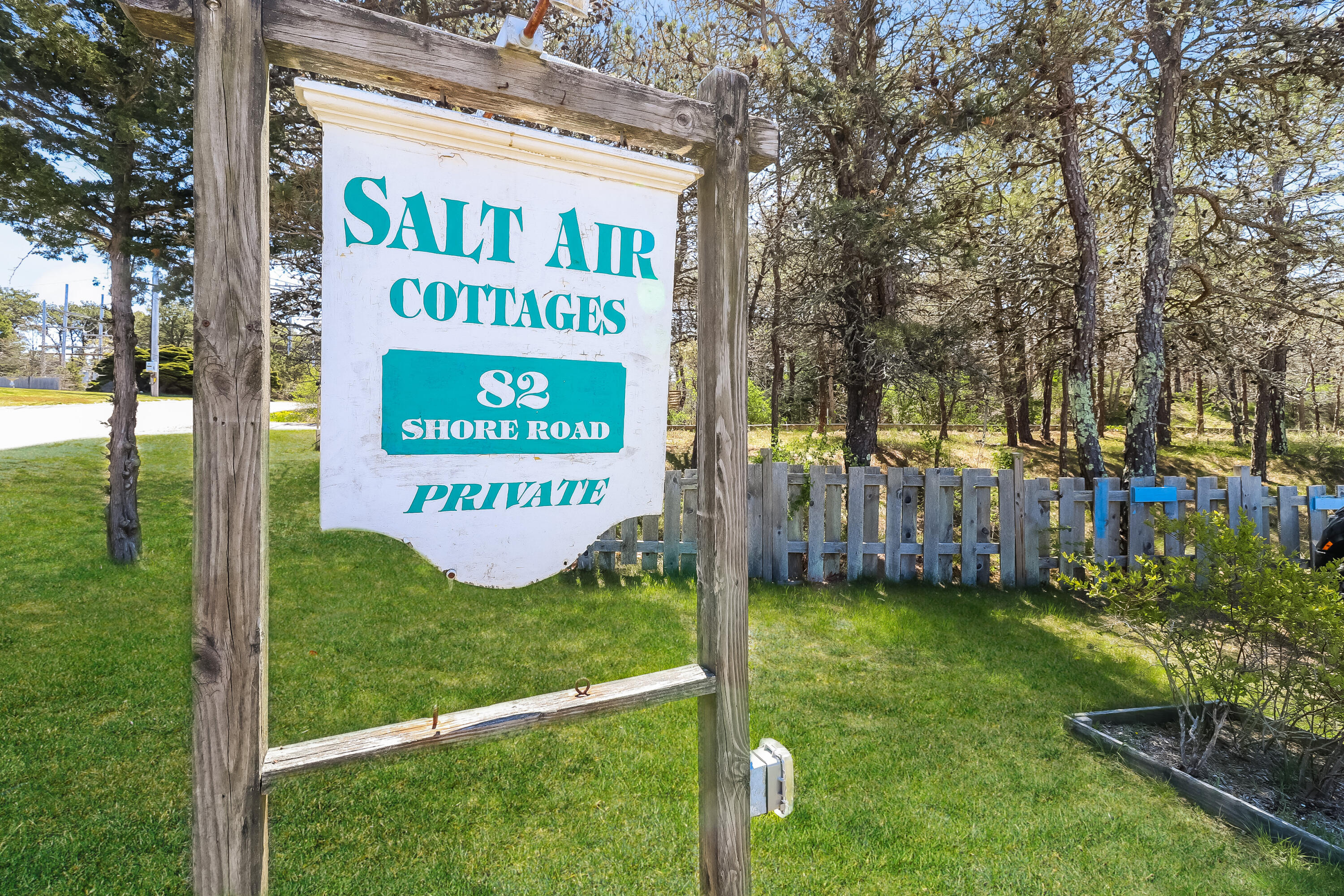 82 Shore Road, Unit 7 Truro, MA 02666 - Photo 13 of 13 a sign on the side of the building