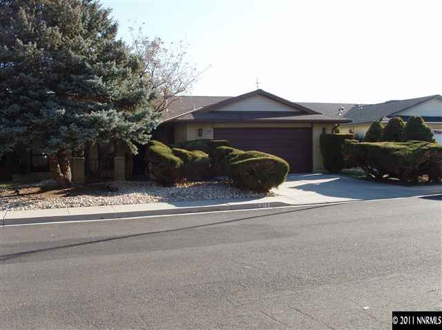 570 Cyma Circle Reno, NV 89503 - Photo 1 of 13 a view of a house with a yard