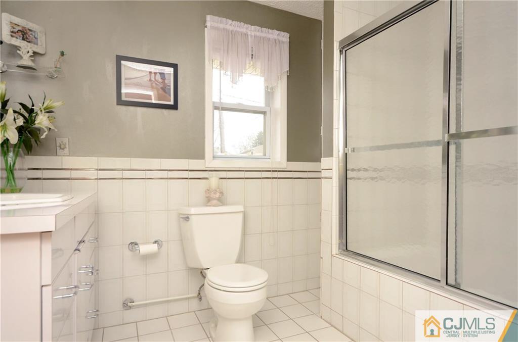 19 Rutgers Road Old Bridge, NJ 08859 - Photo 14 of 25 a bathroom with a toilet and a shower