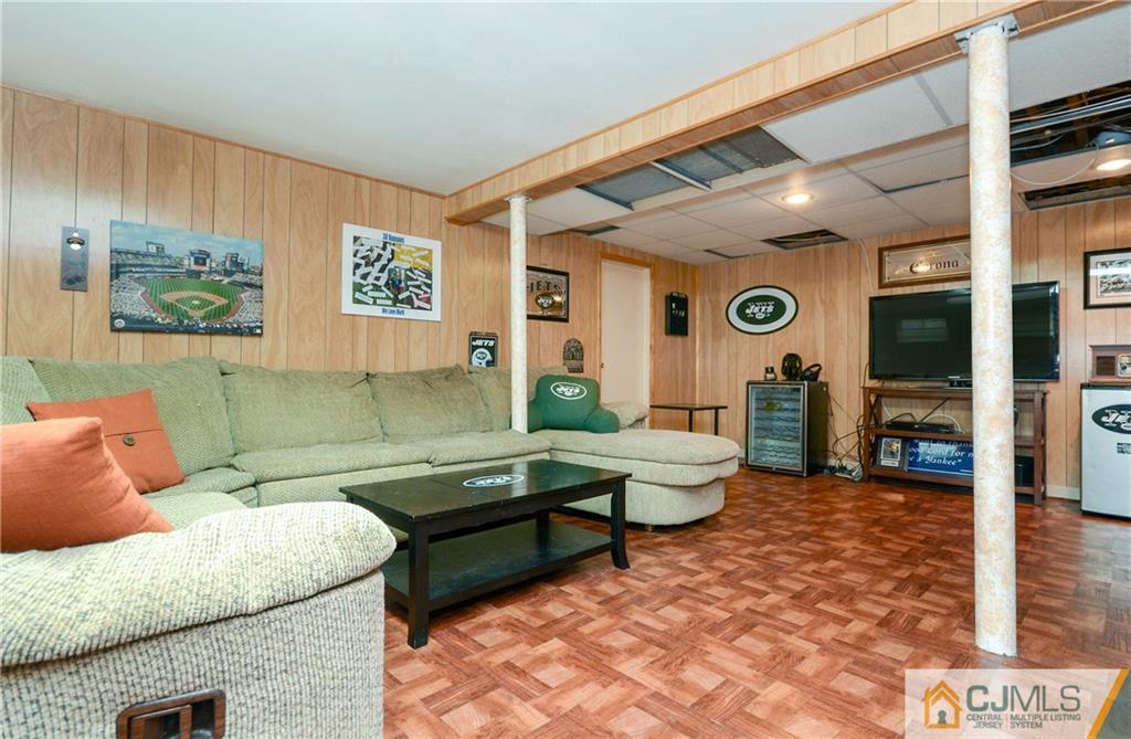 19 Rutgers Road Old Bridge, NJ 08859 - Photo 18 of 25 a living room with furniture and a large window