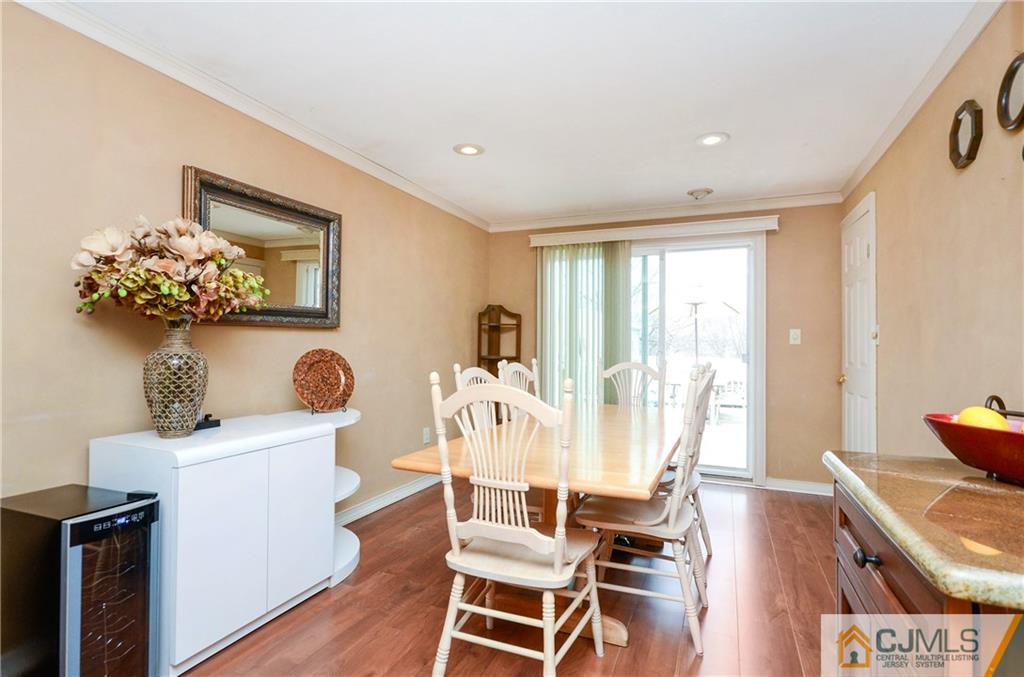 19 Rutgers Road Old Bridge, NJ 08859 - Photo 7 of 25 a living room with furniture and a wooden floor