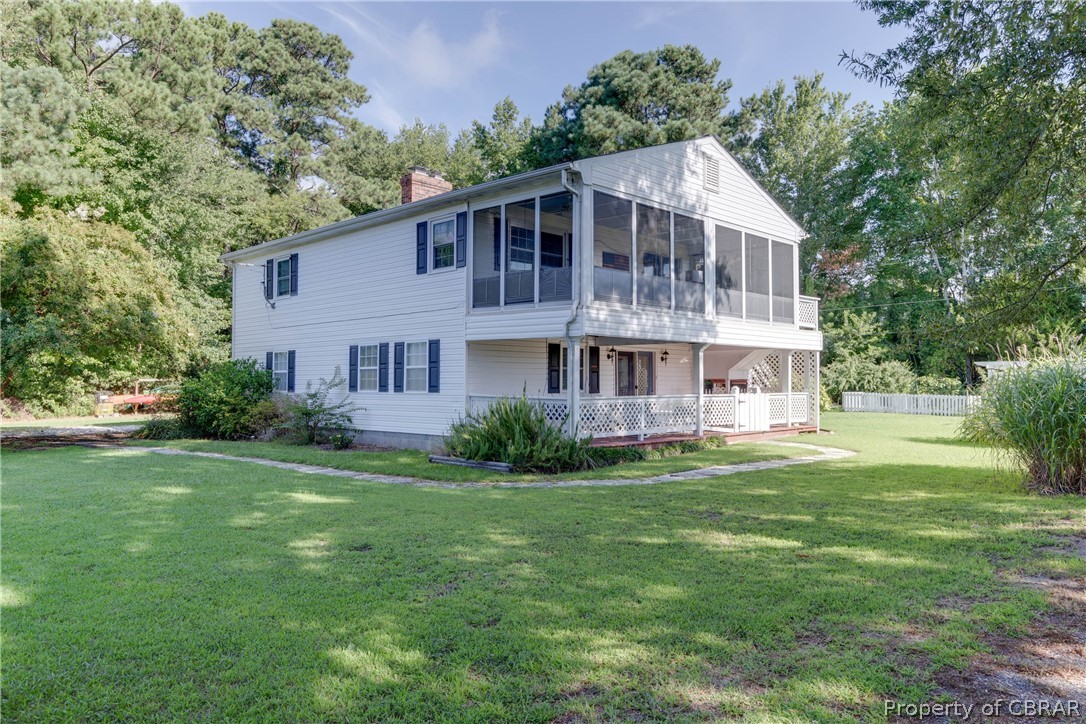 351 Reeves Road Hudgins, VA 23076 - Photo 7 of 41 a view of a house with a yard