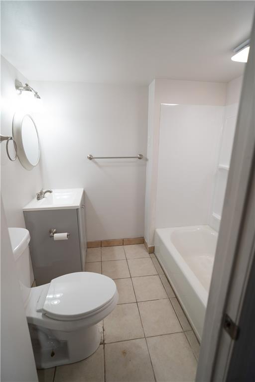 746 Lechner Lane Pittsburgh, PA 15227 - Photo 16 of 25 a bathroom with a sink a toilet and shower