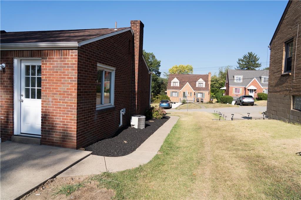 746 Lechner Lane Pittsburgh, PA 15227 - Photo 23 of 25 a view of a house with a yard