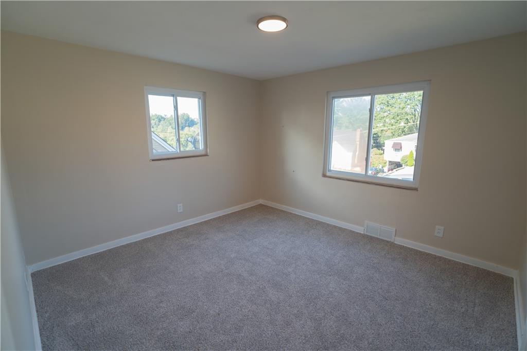 746 Lechner Lane Pittsburgh, PA 15227 - Photo 6 of 25 an empty room with windows