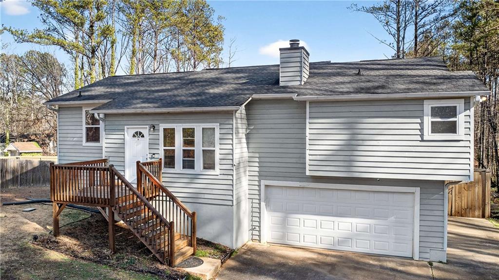 808 Emerald Chase Powder Springs, GA 30127 - Photo 2 of 32 a house view with a outdoor space