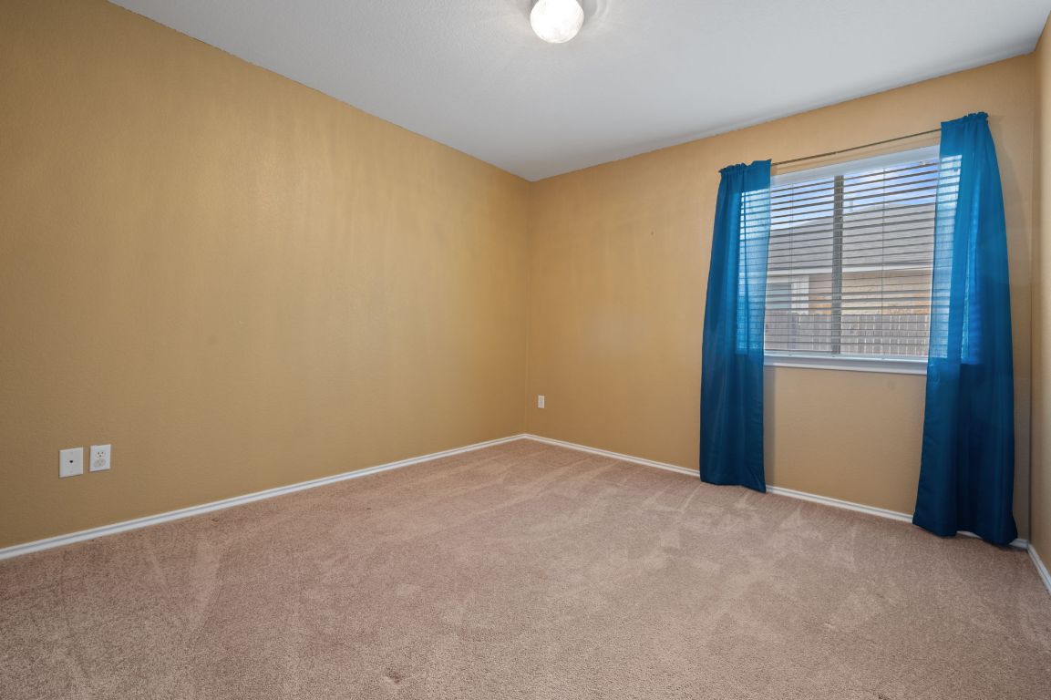 2361 Pearson Way Round Rock, TX 78665 - Photo 13 of 32 an empty room with windows