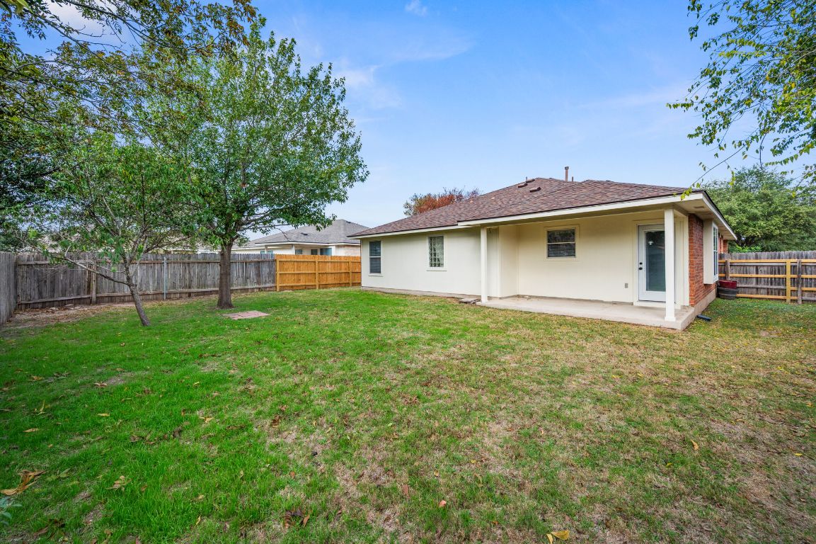 2361 Pearson Way Round Rock, TX 78665 - Photo 22 of 32 a view of a backyard with a plants