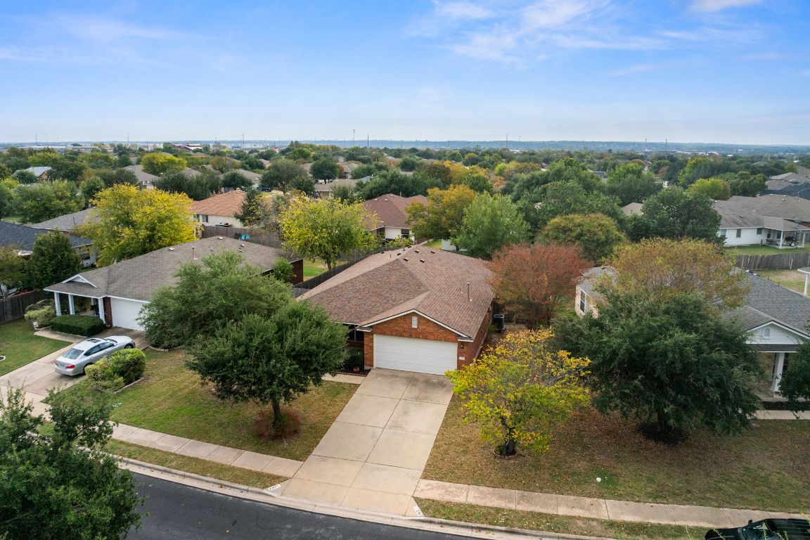 2361 Pearson Way Round Rock, TX 78665 - Photo 24 of 32 an aerial view of residential houses with outdoor space and trees