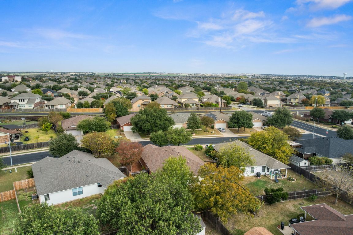 2361 Pearson Way Round Rock, TX 78665 - Photo 29 of 32 an aerial view of residential houses with outdoor space and trees