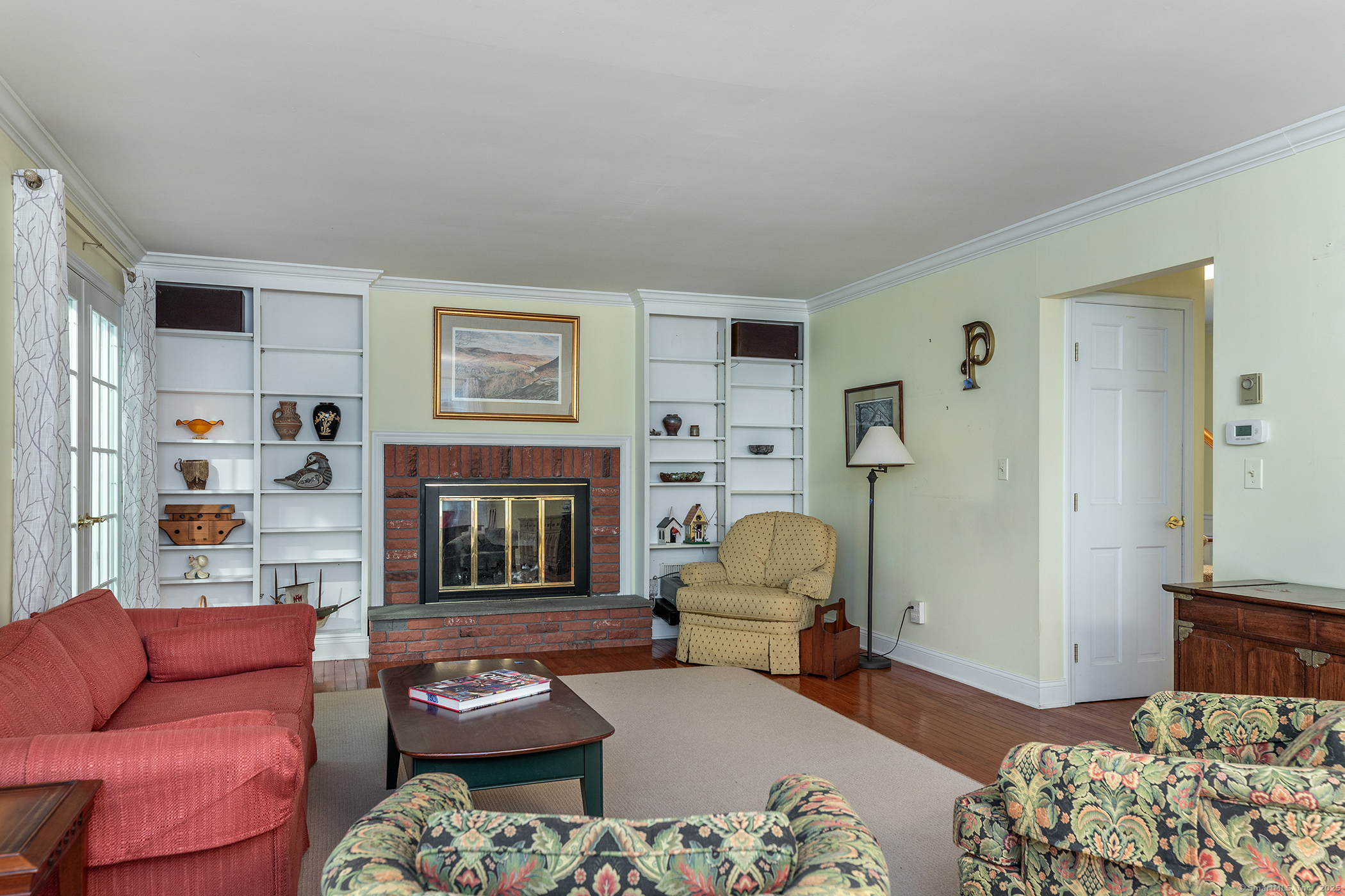 132 South Kent Road Kent, CT 06757 - Photo 11 of 26 a living room with furniture and a fireplace