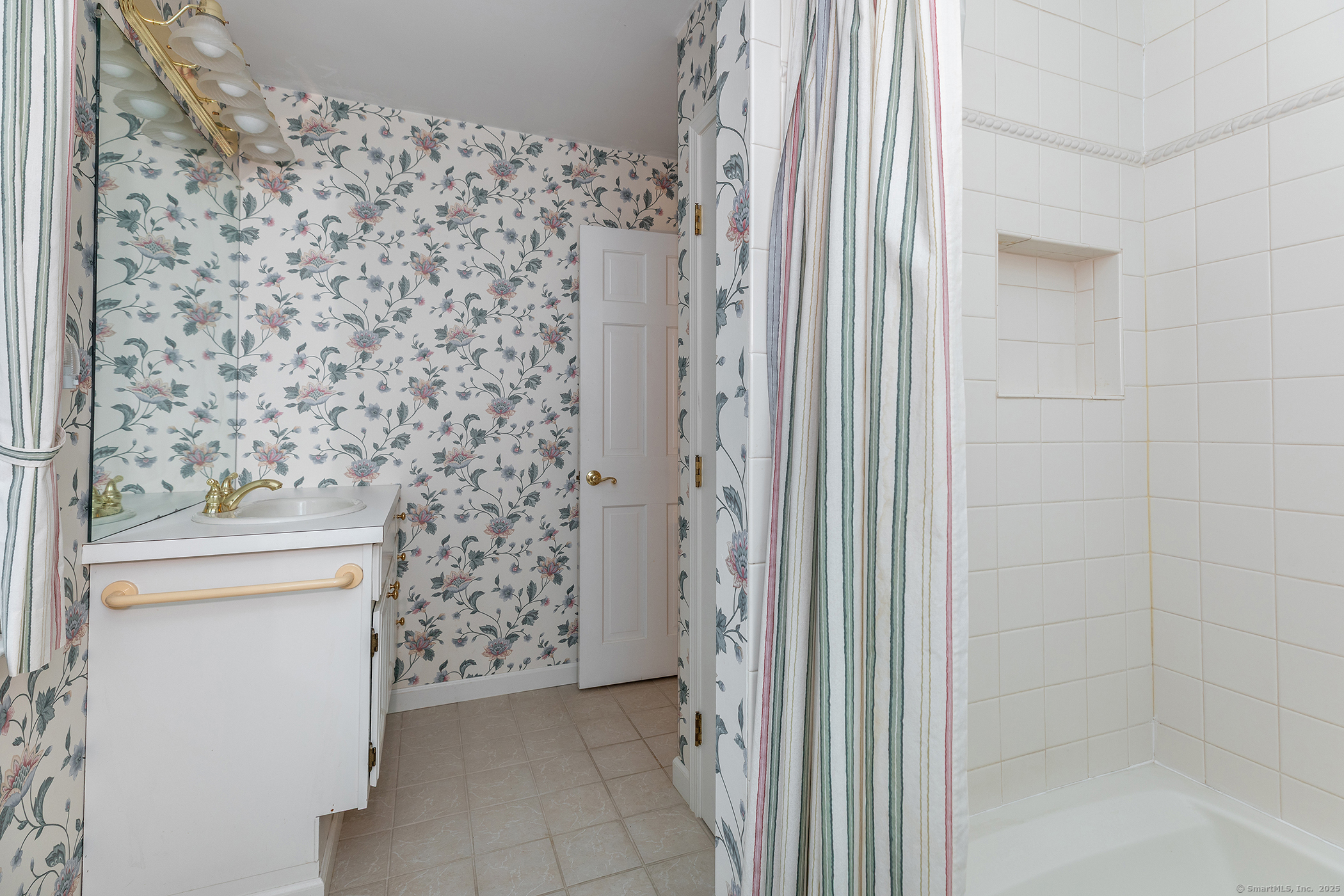 132 South Kent Road Kent, CT 06757 - Photo 24 of 26 a bathroom with a shower curtain