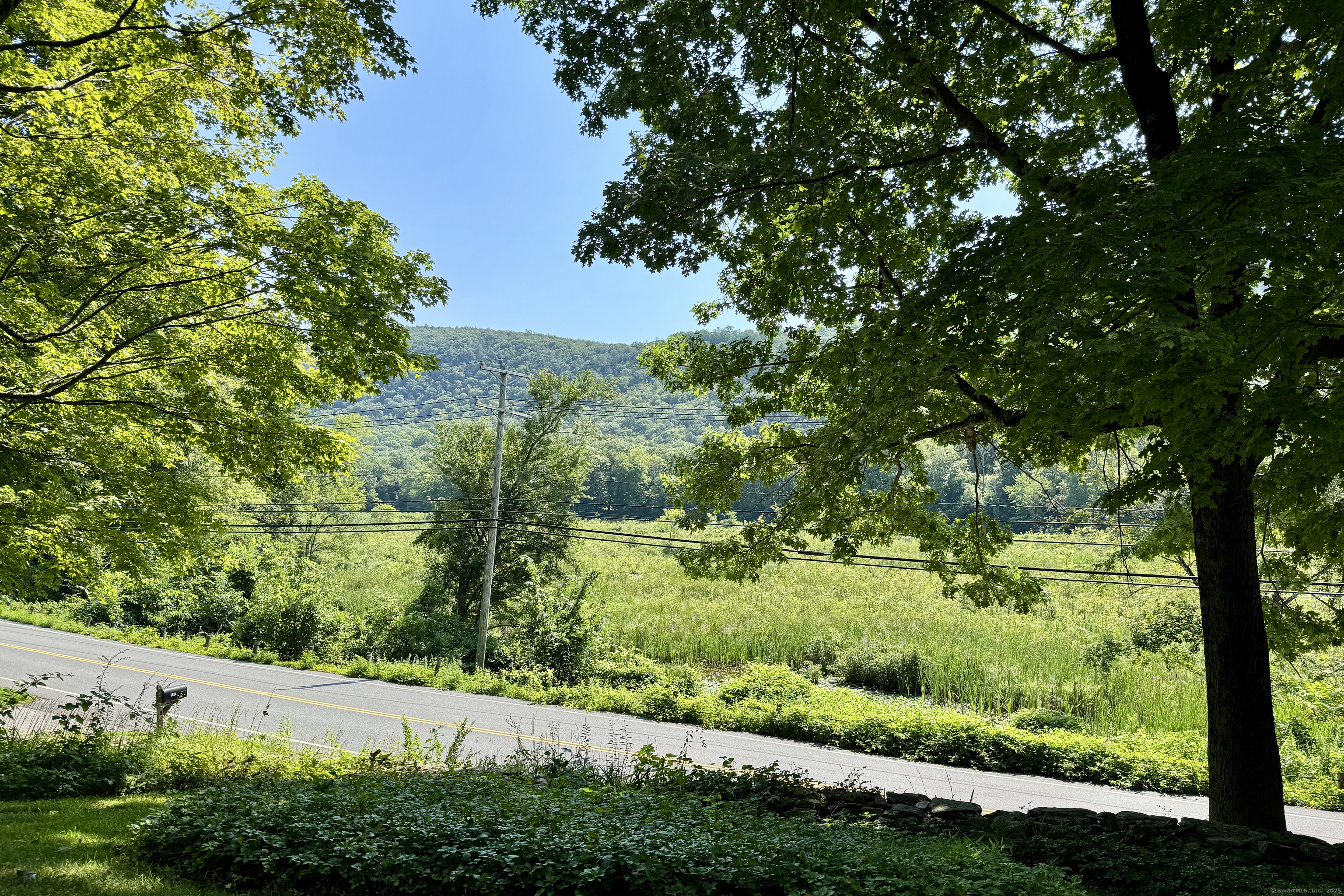 132 South Kent Road Kent, CT 06757 - Photo 5 of 26 a view of a lush green space