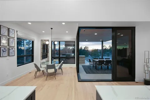 a view of a lobby with furniture and floor to ceiling window