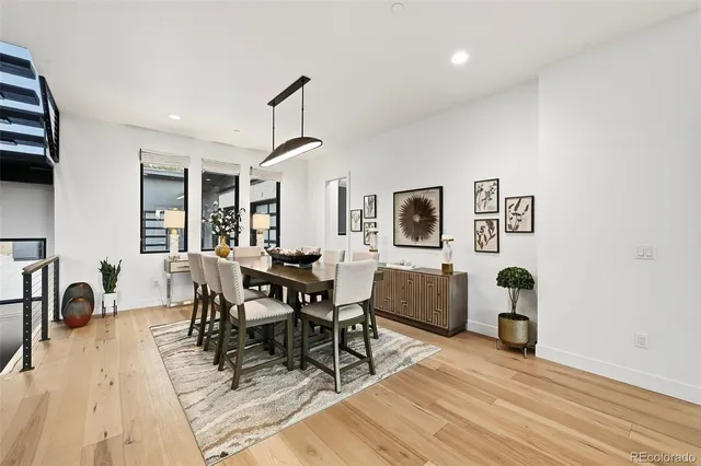 a kitchen with stainless steel appliances kitchen island granite countertop a sink and a stove