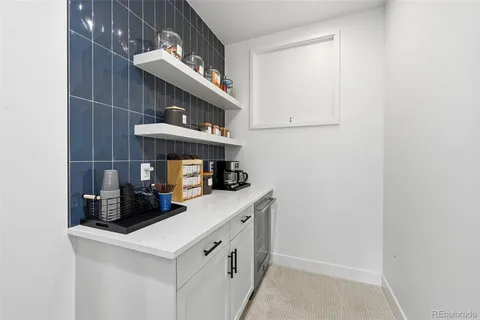 a kitchen with a stove and cabinets