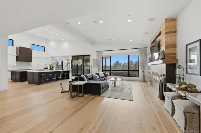 a kitchen with a stove a sink and a refrigerator
