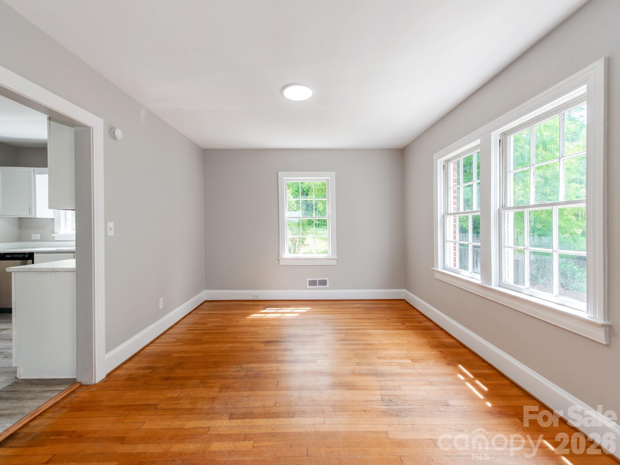 113 Falls Street Morganton, NC 28655 - Photo 8 of 33 a view of an empty room with a window
