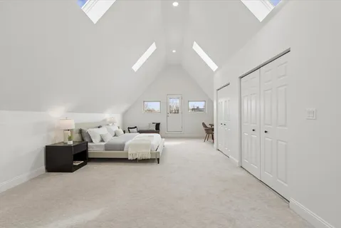 a bed room with furniture and wooden floor