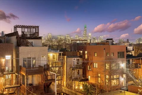 a view of a balcony with city view