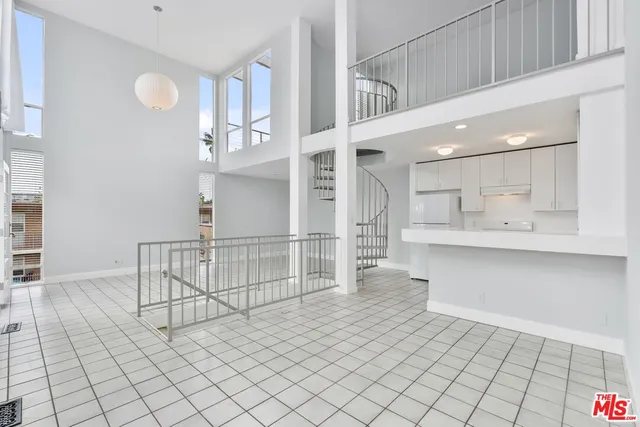 a view of kitchen with furniture and window