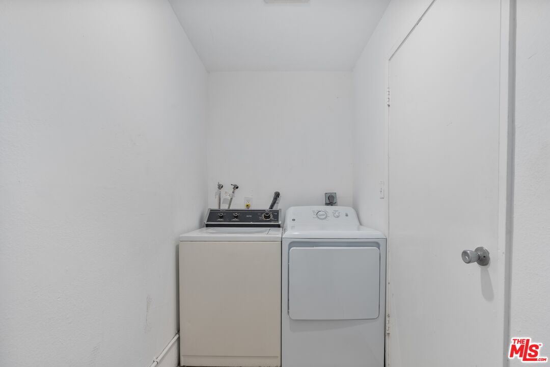 114 Fleet Street Marina del Rey, CA 90292 - Photo 23 of 26 a utility room with dryer and washer