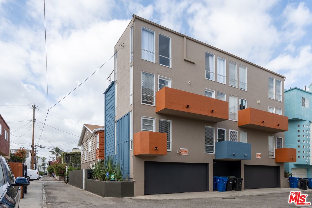 114 Fleet Street Marina del Rey, CA 90292 - Photo 26 of 26 a front view of a building with many windows