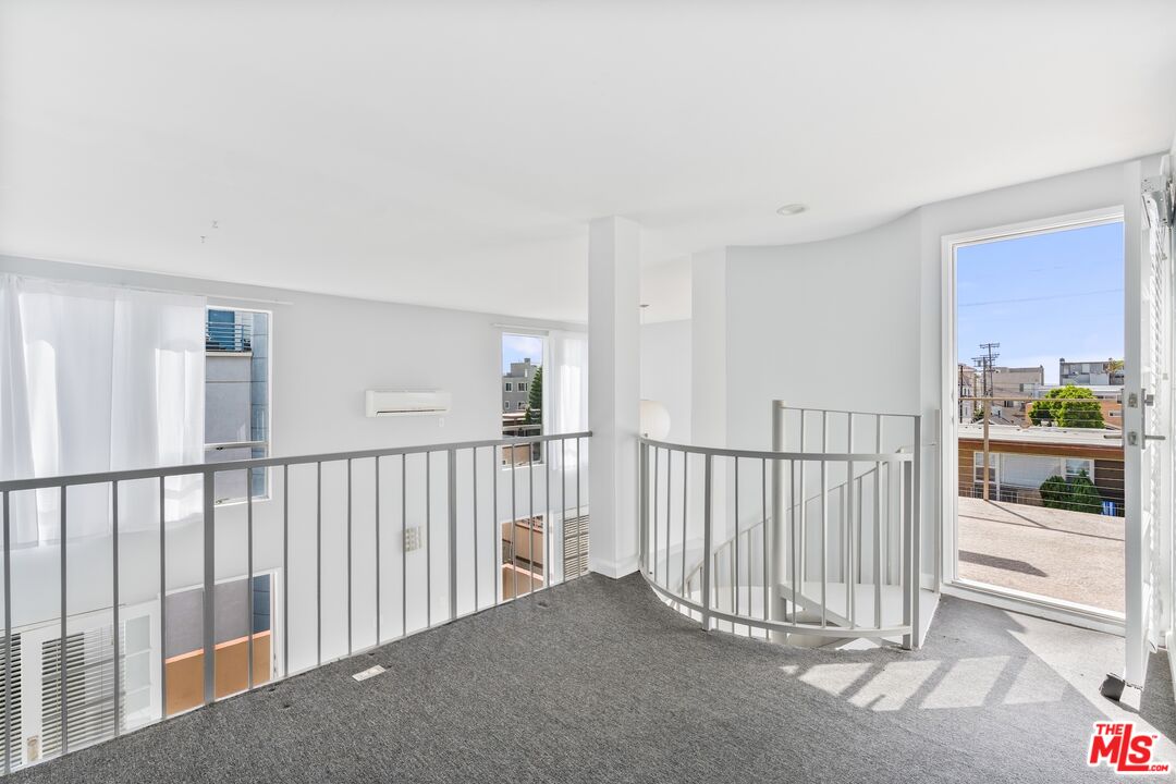 114 Fleet Street Marina del Rey, CA 90292 - Photo 8 of 26 a view of a hallway with a staircase