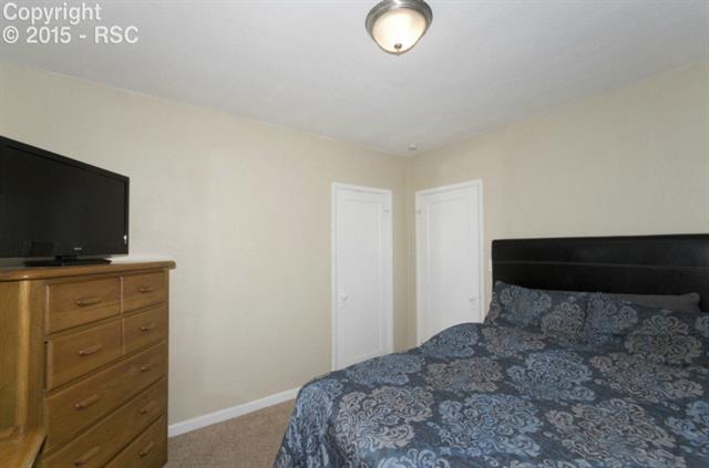 615 Sunset Road Colorado Springs, CO 80909 - Photo 13 of 20 Another view of the master bedroom