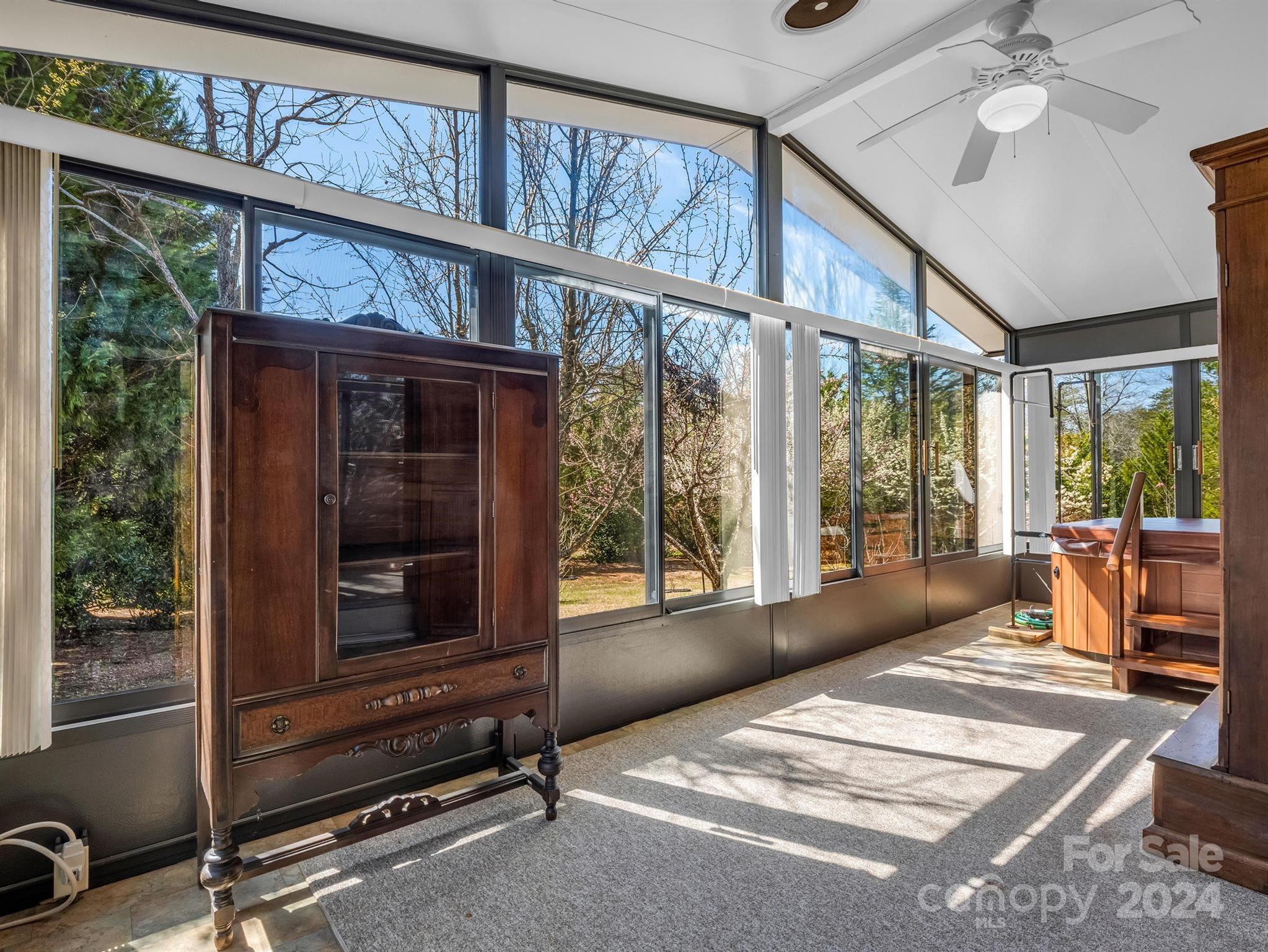 399 River Ridge Parkway Rutherfordton, NC 28139 - Photo 18 of 48 a living room with furniture tv and a window