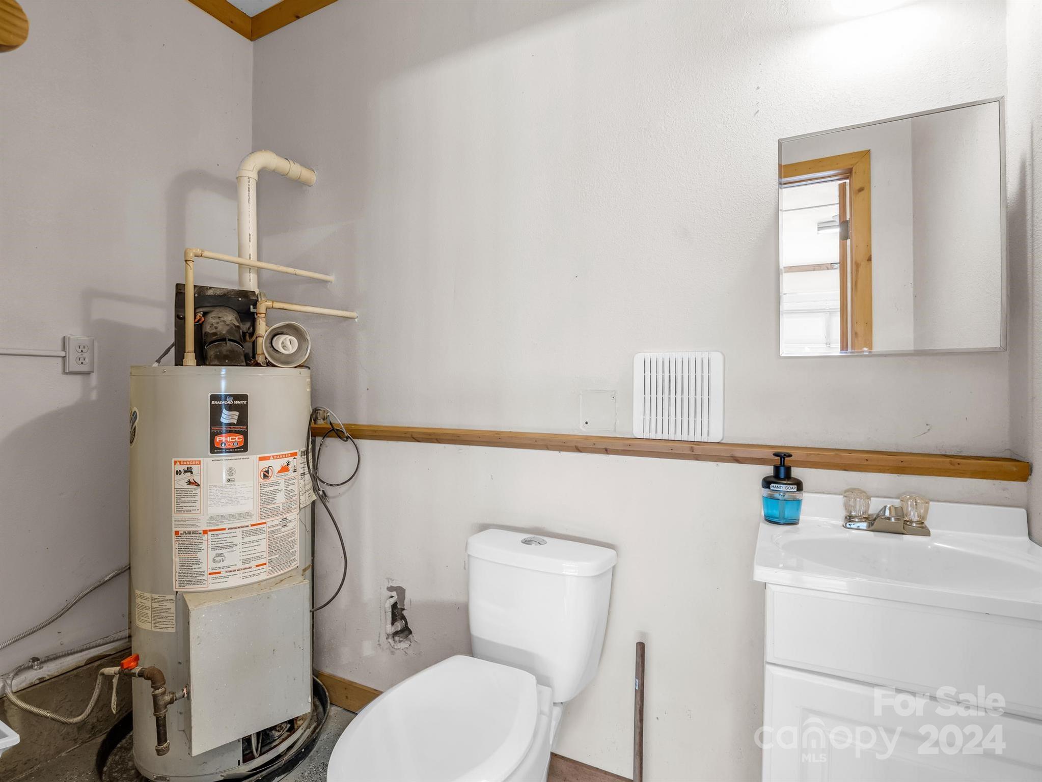 399 River Ridge Parkway Rutherfordton, NC 28139 - Photo 24 of 48 a bathroom with a toilet and a sink