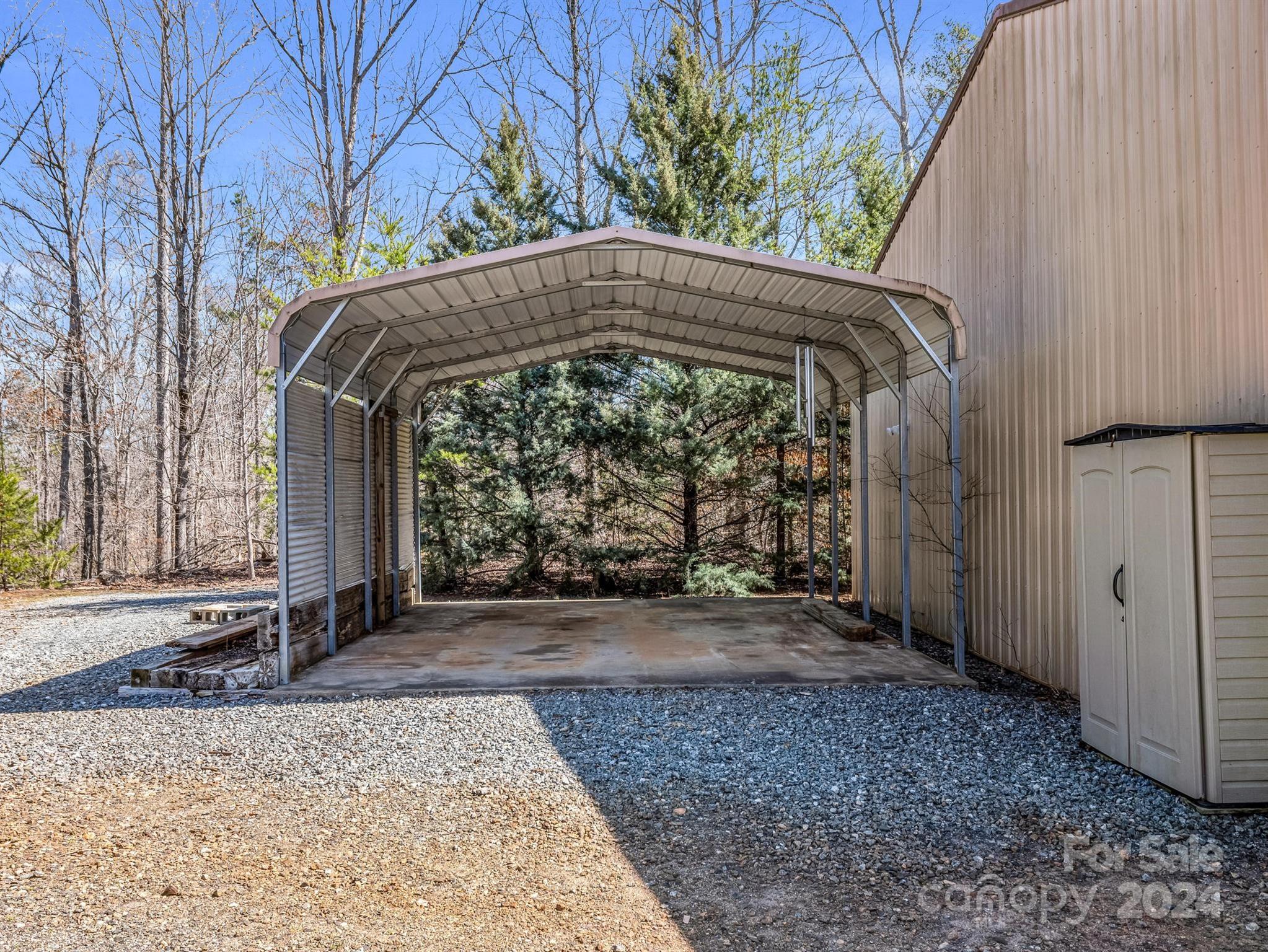 399 River Ridge Parkway Rutherfordton, NC 28139 - Photo 29 of 48 a view of a yard with an outdoor space