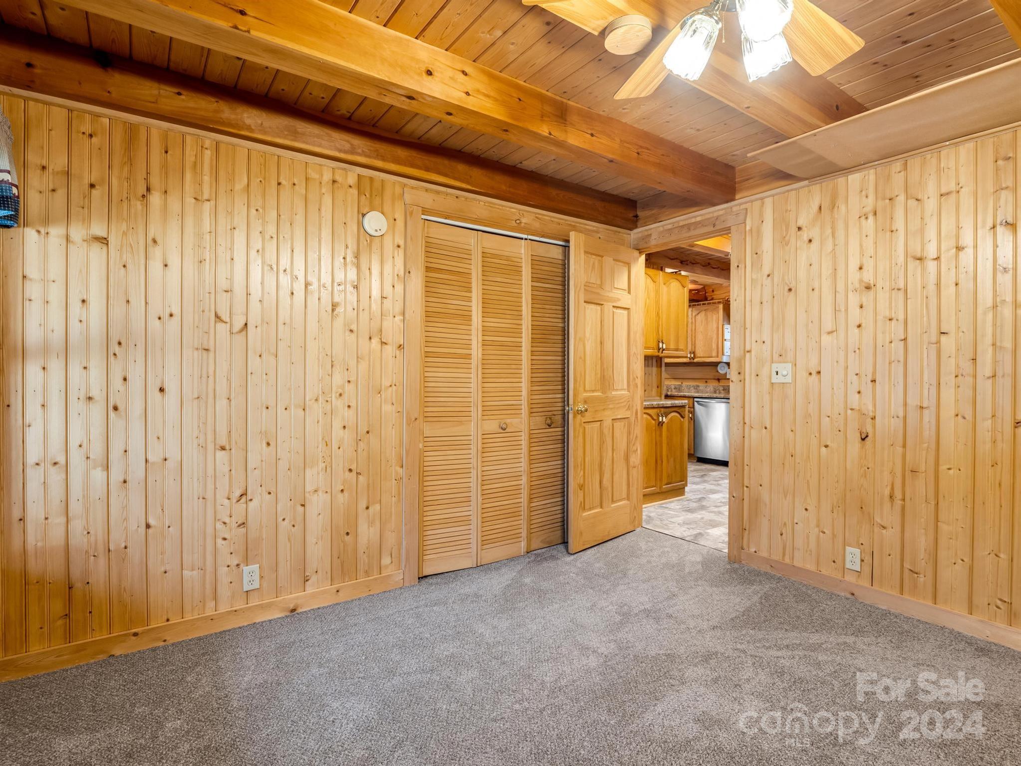 399 River Ridge Parkway Rutherfordton, NC 28139 - Photo 8 of 48 a view of entryway with wooden walls