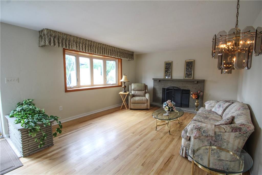 637 Greenlee Road Pittsburgh, PA 15227 - Photo 5 of 25 There lots of natural sunshine pouring thru the windows and features a handsome log burning fireplace